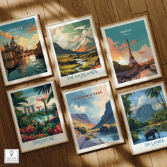 Set of six framed travel posters featuring Venice, Paris, Singapore, Sri Lanka, Highlands, and Llanberis Pass on a wooden floor.