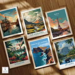 Set of six travel art prints in natural wood frames on wooden floor, featuring Venice, Paris, The Highlands, Singapore, Ponta de São Lourenço, and Sri Lanka scenes.