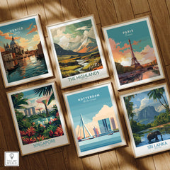 Set of six framed travel art prints featuring Venice, The Highlands, Paris, Singapore, Rotterdam, and Sri Lanka, displayed on a wooden floor.