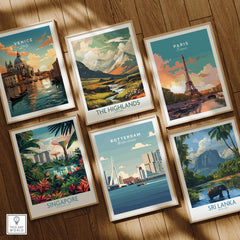 Set of six framed travel posters featuring Venice, Paris, Highlands, Singapore, Rotterdam, Sri Lanka on wooden floor
