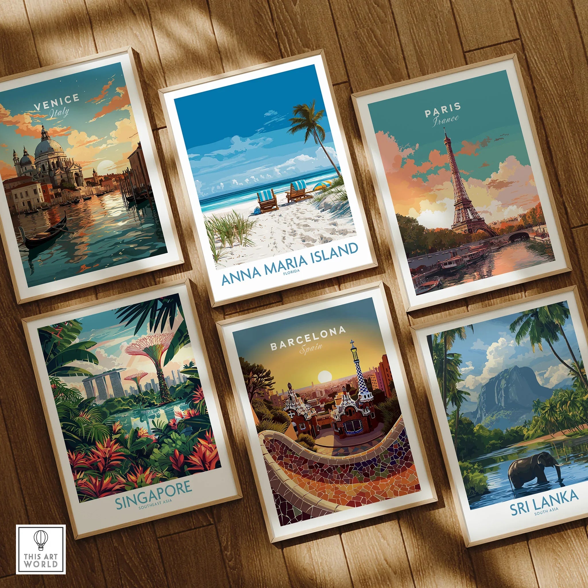 Set of six framed travel posters on wooden floor featuring Venice, Anna Maria Island, Paris, Singapore, Barcelona, and Sri Lanka scenic wall art.