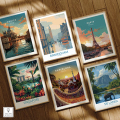 Set of six framed travel art prints featuring Venice, Birmingham, Paris, Singapore, Barcelona, and Sri Lanka on a wooden floor.