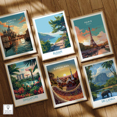 Set of six framed travel art prints featuring Venice, Paris, Busan, Singapore, Barcelona, and Sri Lanka on a wooden floor.