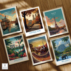 Set of six framed travel posters featuring Venice, Central Park, Paris, Singapore, Barcelona, and Sri Lanka on a wooden floor.
