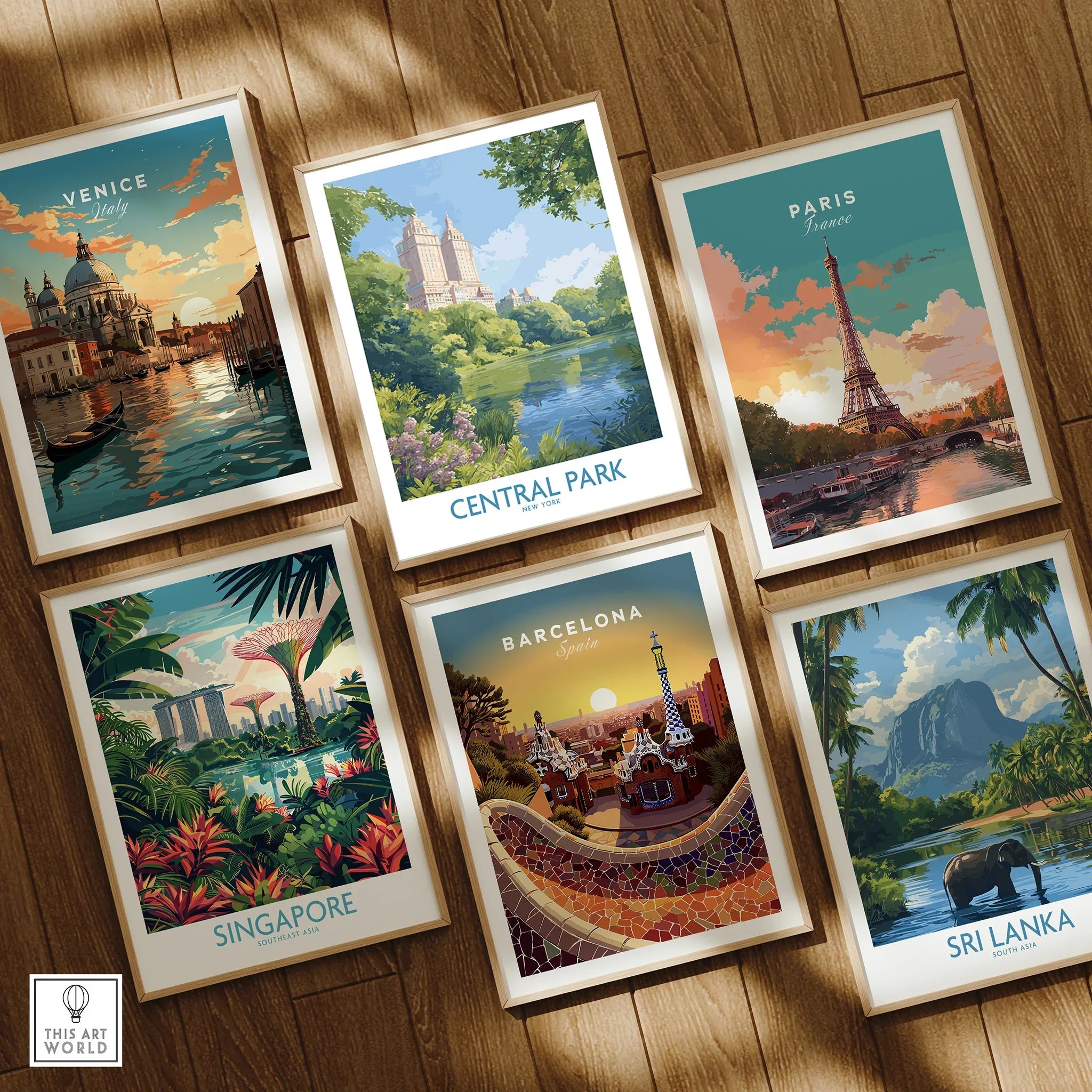 Set of six framed travel art prints on wooden floor, featuring Venice, Central Park, Paris, Singapore, Barcelona, and Sri Lanka wall decor.