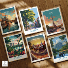 Set of six framed travel posters including Venice, Paris, Barcelona, Singapore, Colchester, Sri Lanka on wooden floor