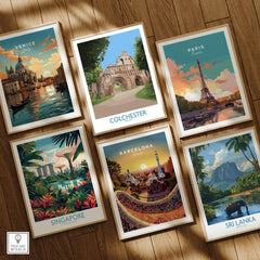 Six framed travel poster art prints of Venice, Colchester, Paris, Singapore, Barcelona, and Sri Lanka on wooden floor