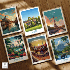 Set of six framed travel posters featuring Venice, Lewes, Paris, Singapore, Barcelona, and Sri Lanka on wooden floor.