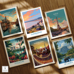 Set of six framed travel art prints featuring Venice, Llandudno, Paris, Singapore, Barcelona, Sri Lanka on wooden floor