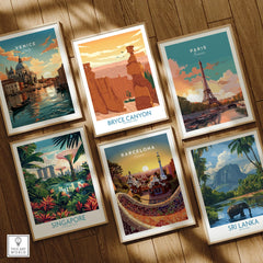 Set of six framed travel posters featuring Venice, Bryce Canyon, Paris, Singapore, Barcelona, and Sri Lanka on a wooden floor.