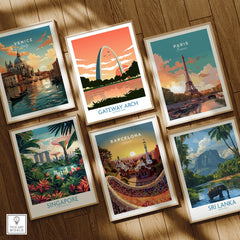 Set of six framed travel art prints featuring Venice, Gateway Arch, Paris, Singapore, Barcelona, and Sri Lanka on a wooden floor.