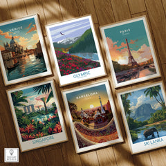 Set of six framed travel posters featuring Venice, Olympic National Park, Paris, Singapore, Barcelona, and Sri Lanka on a wooden floor.