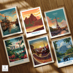 Set of six framed travel posters featuring Venice, Pinnacles National Park, Paris, Singapore, Barcelona, and Sri Lanka on a wooden floor.