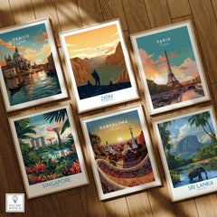 Set of six framed travel and national park art prints on wooden floor, featuring Venice, Zion, Paris, Singapore, Barcelona, and Sri Lanka scenes.