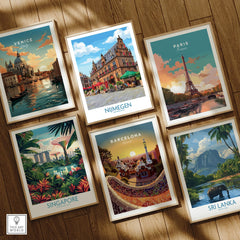 Set of six framed travel art prints featuring Venice, Nijmegen, Paris, Singapore, Barcelona, Sri Lanka, displayed on a wooden floor.