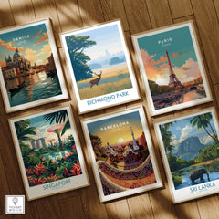 Set of six framed travel posters featuring Venice, Richmond Park, Paris, Singapore, Barcelona, and Sri Lanka on a wooden floor.