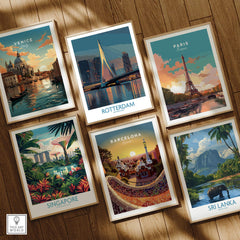 Set of six framed travel art prints on wooden floor featuring Venice, Rotterdam, Paris, Singapore, Barcelona, and Sri Lanka landmarks.