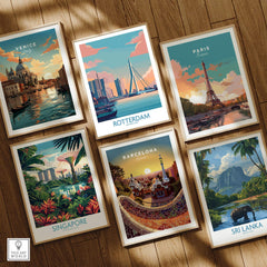 Set of six framed travel posters featuring Venice, Rotterdam, Paris, Singapore, Barcelona, and Sri Lanka on a wooden floor.