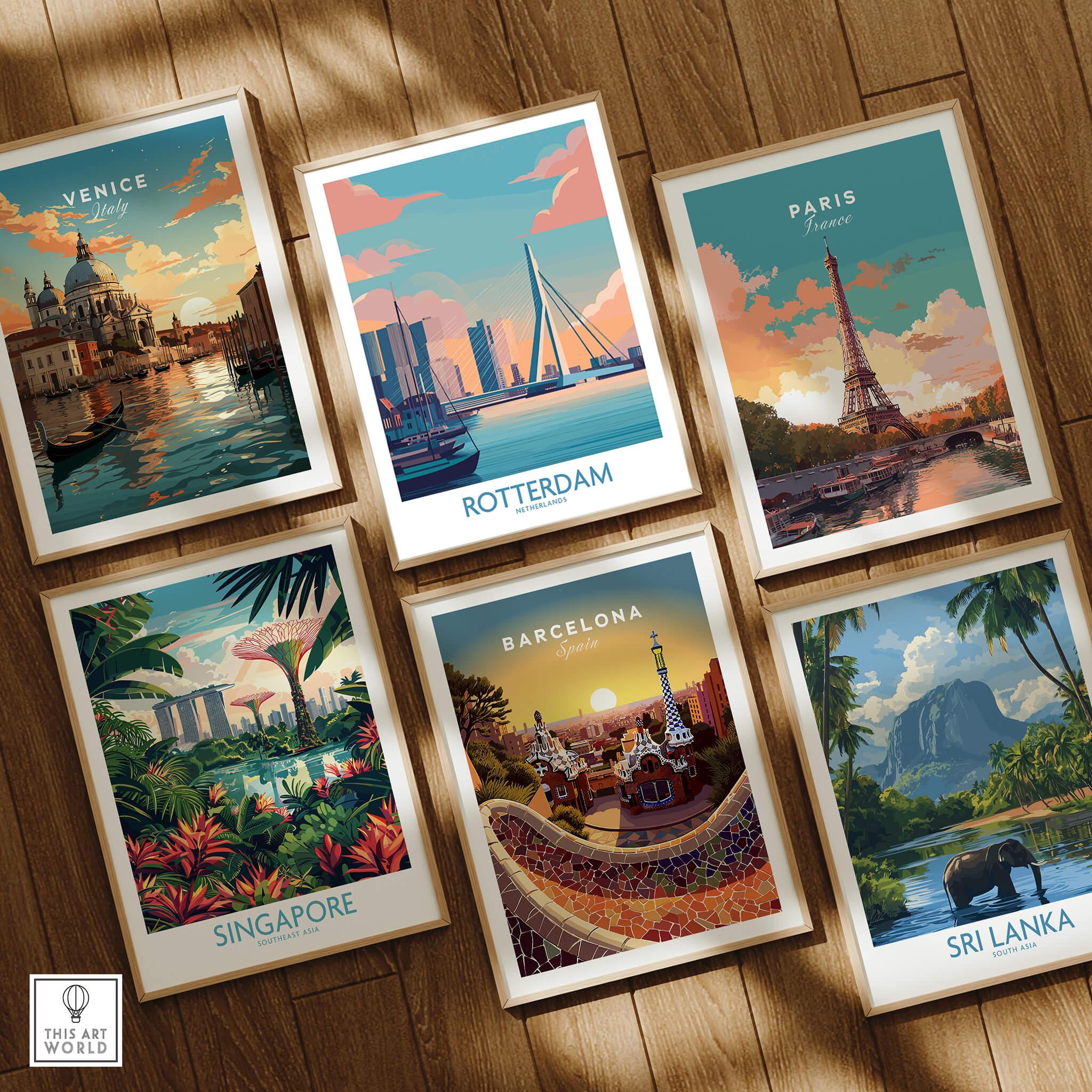 Set of six framed travel posters featuring Venice, Rotterdam, Paris, Singapore, Barcelona, and Sri Lanka on a wooden floor.