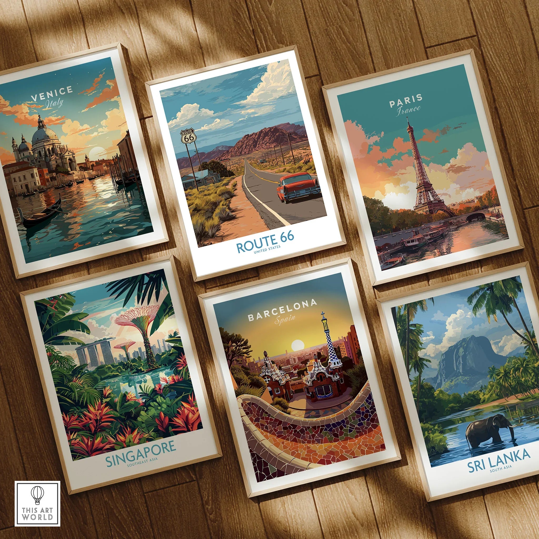 Set of six framed travel art prints with city and nature scenes on a wooden floor