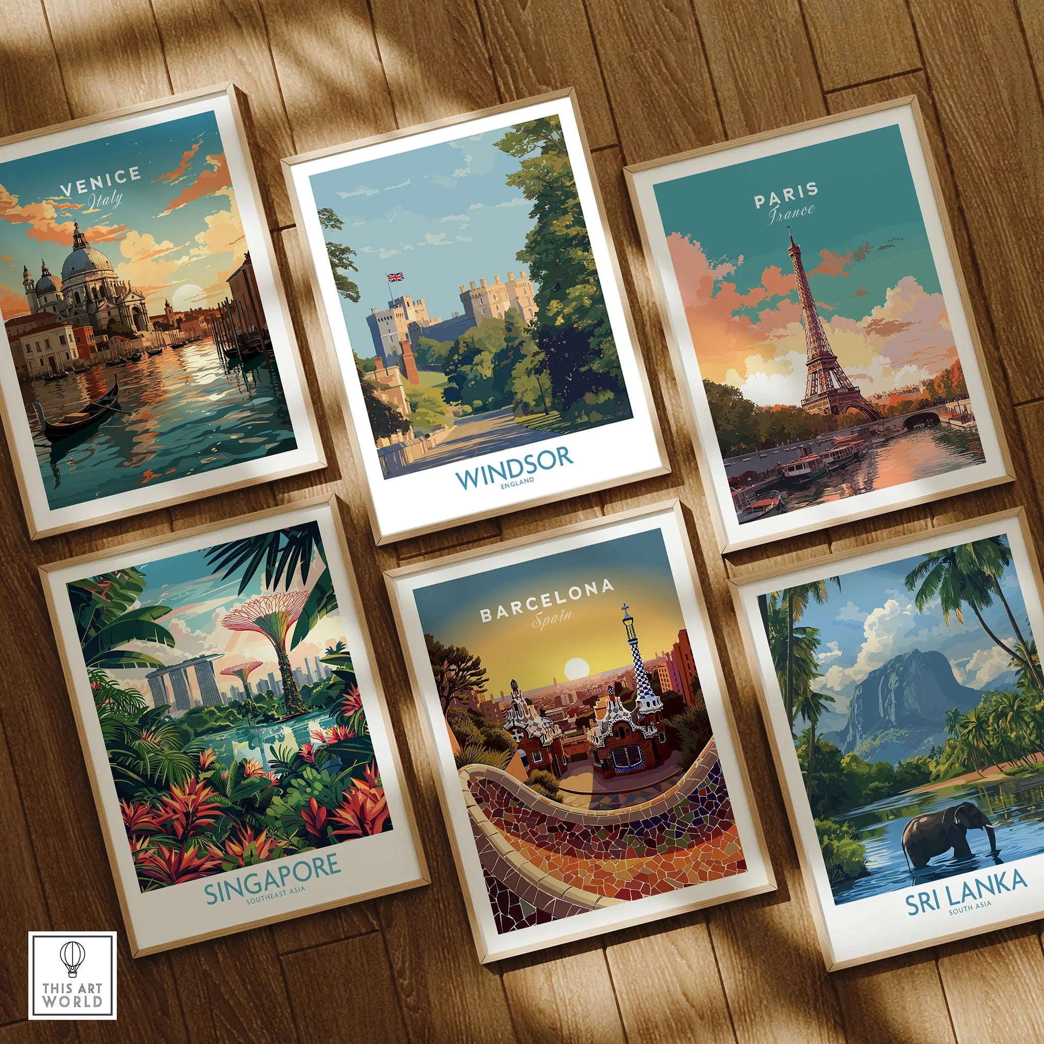 Set of six framed travel posters with city and nature landscapes on wooden floor