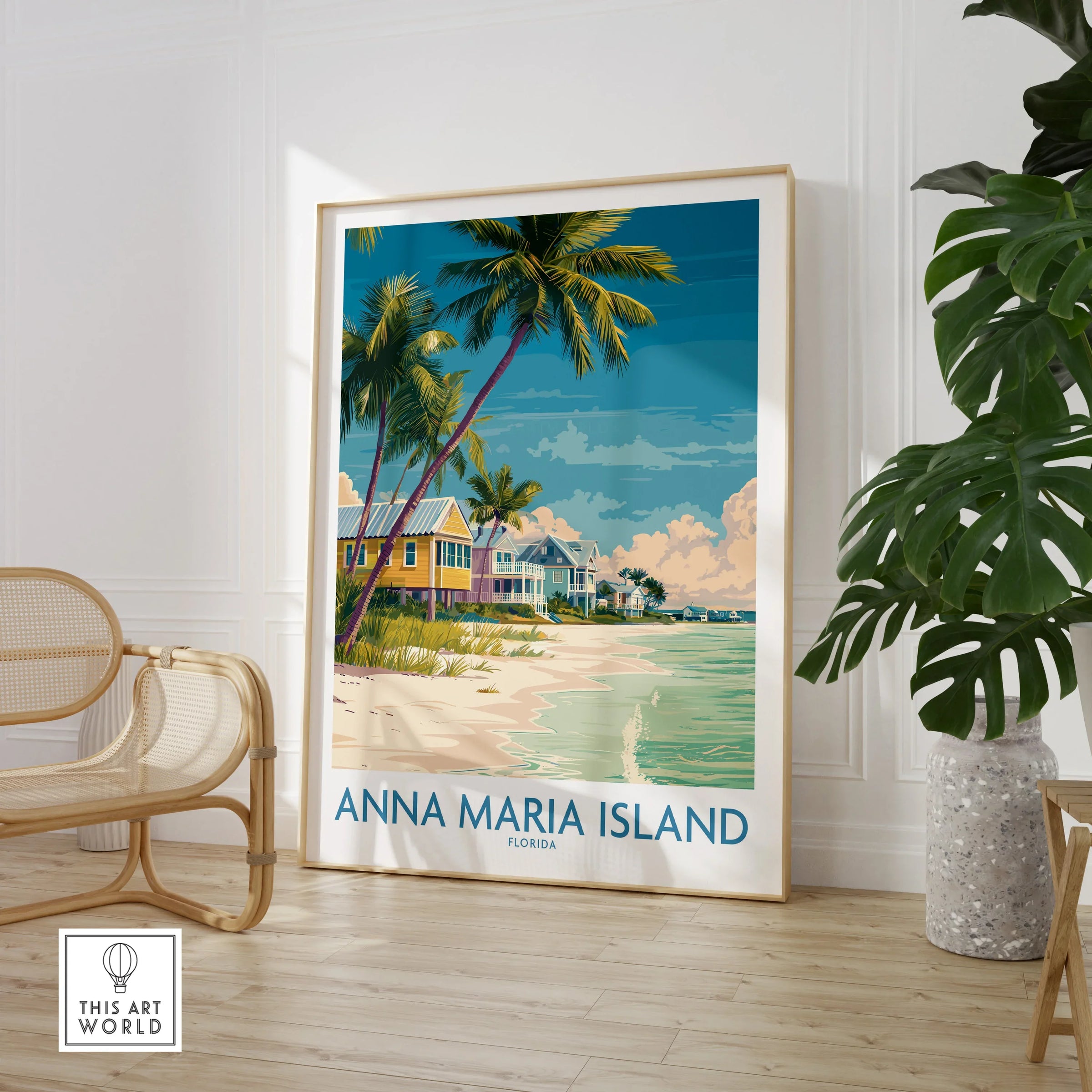 Anna Maria Island framed travel poster with beach scene, palm trees, and colorful houses in a modern room setting.