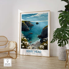 Berry Head Devon Print – Rocky Cliffs and Turquoise Sea Wall Decor displayed in a bright interior with a cozy chair.