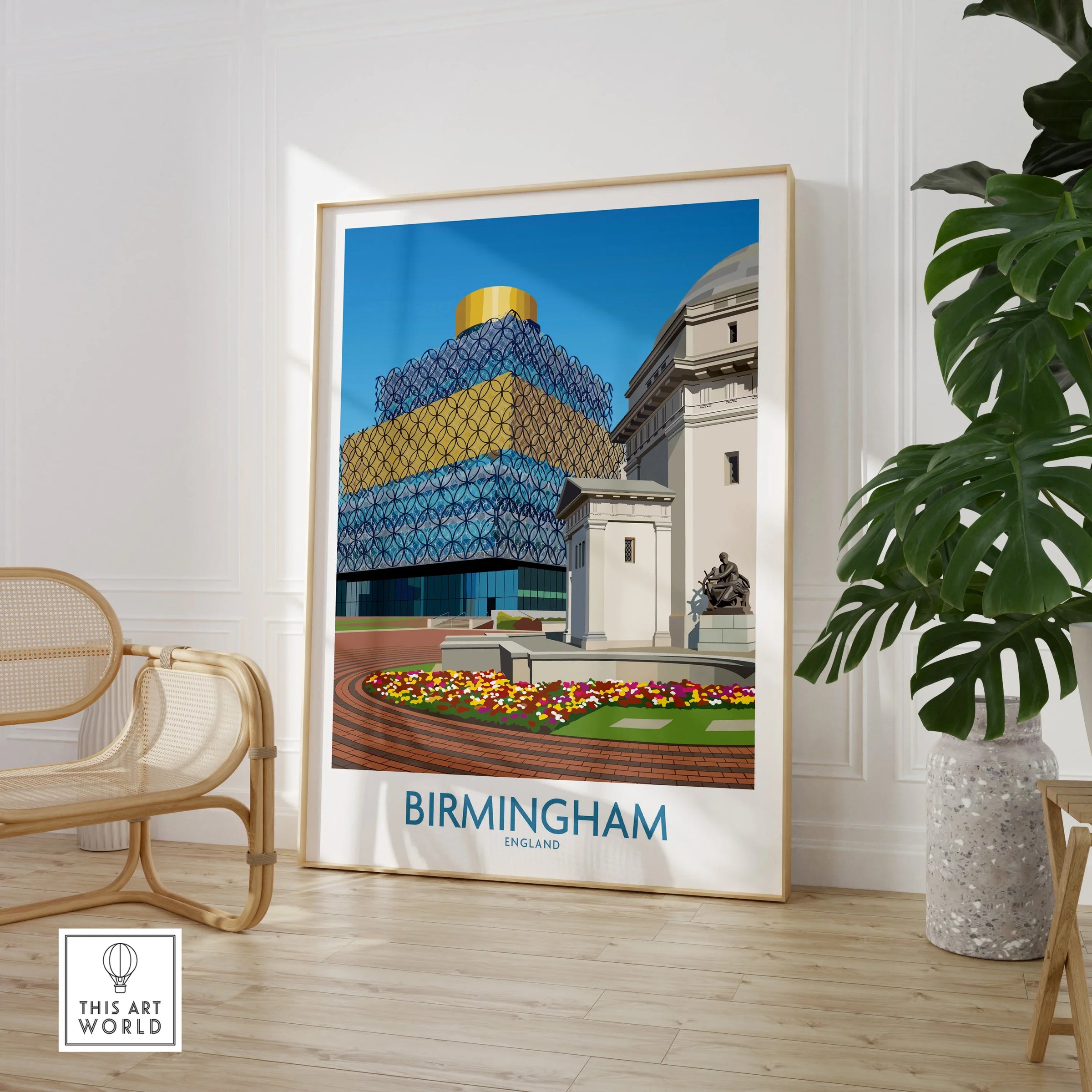 Framed Birmingham city skyline art print in modern living room with chair and plant