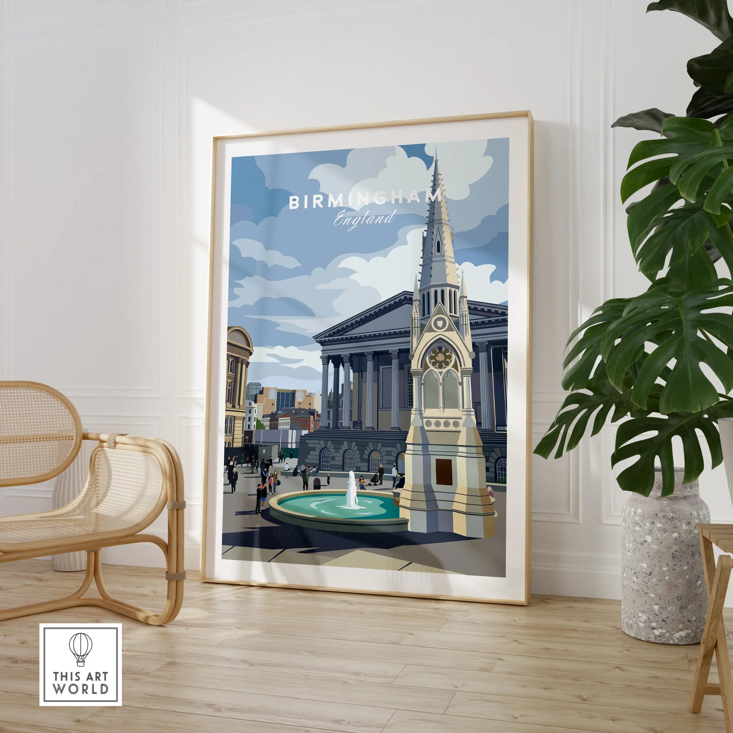 Framed Birmingham England travel poster in modern room with chair and green plant