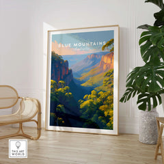 Blue Mountains Australia framed travel poster in modern room with green plant and chair