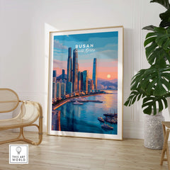 Framed Busan South Korea city poster in modern room with chair and plant