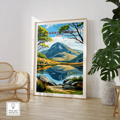 Framed Cadair Idris Wales travel poster in modern room with chair and plant, wall art decor