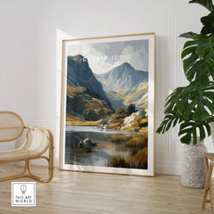 Framed Cadair Idris Wales travel poster print in modern living room with chair and plant