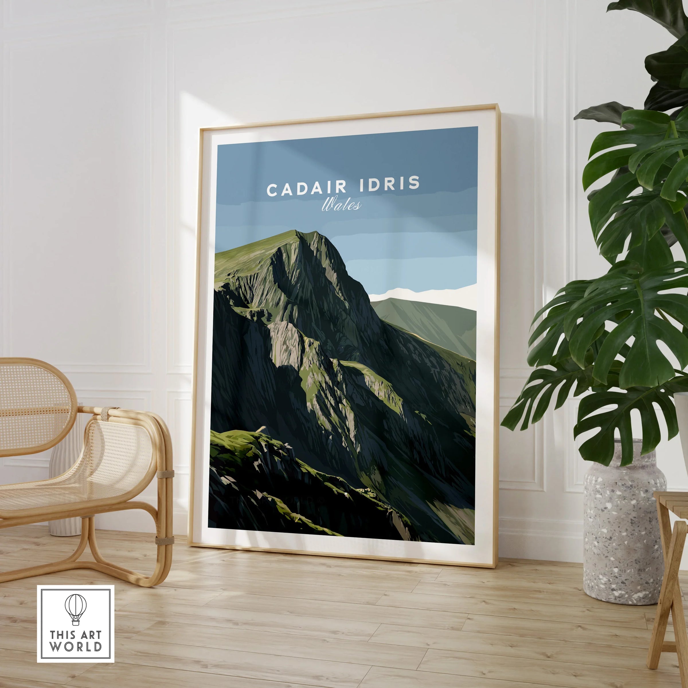 Cadair Idris Wales travel poster framed print in modern room with chair and plant