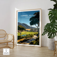 Framed Carmel Valley California travel poster in modern room with chair and plant