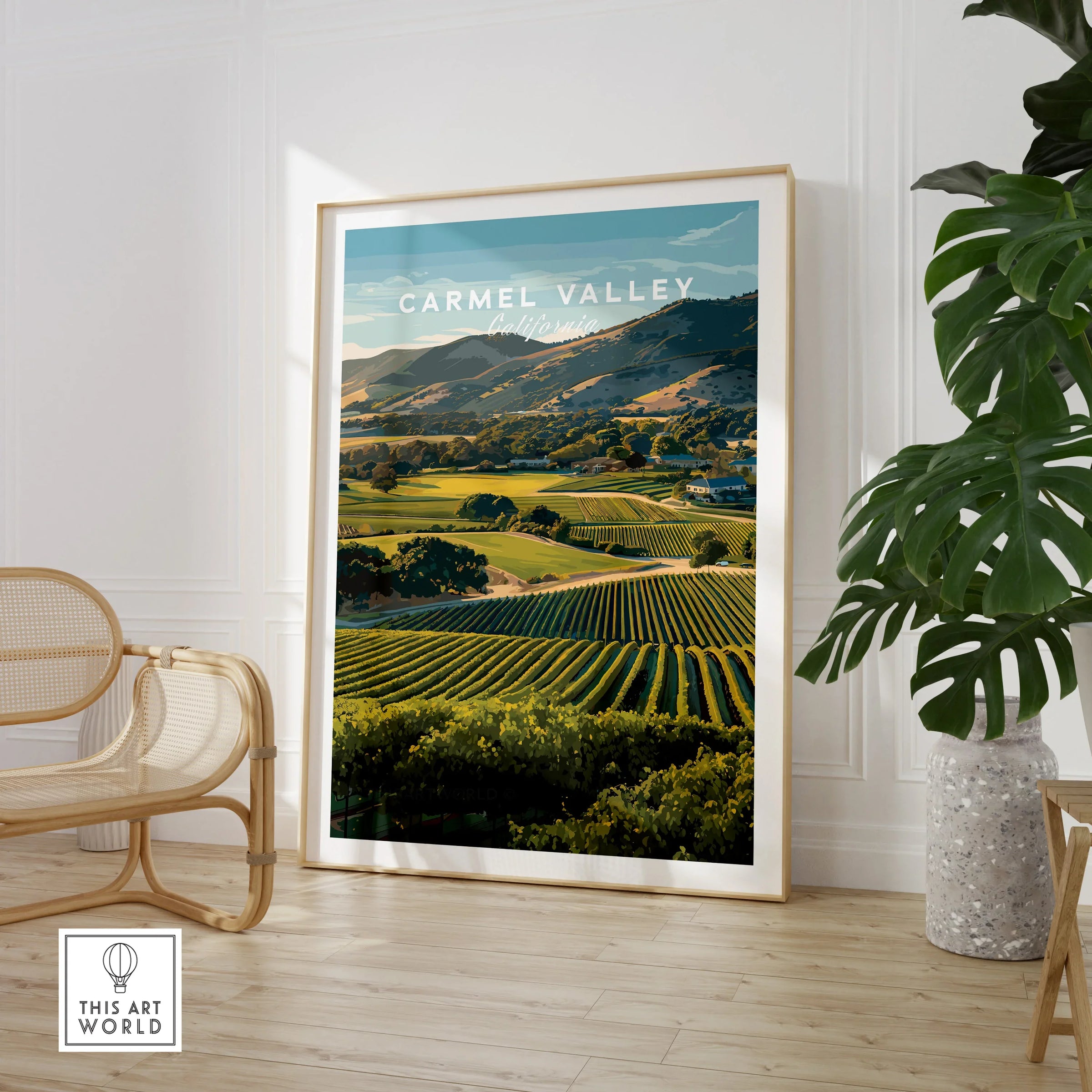 Carmel Valley California travel poster framed, displayed in modern room with chair and plant