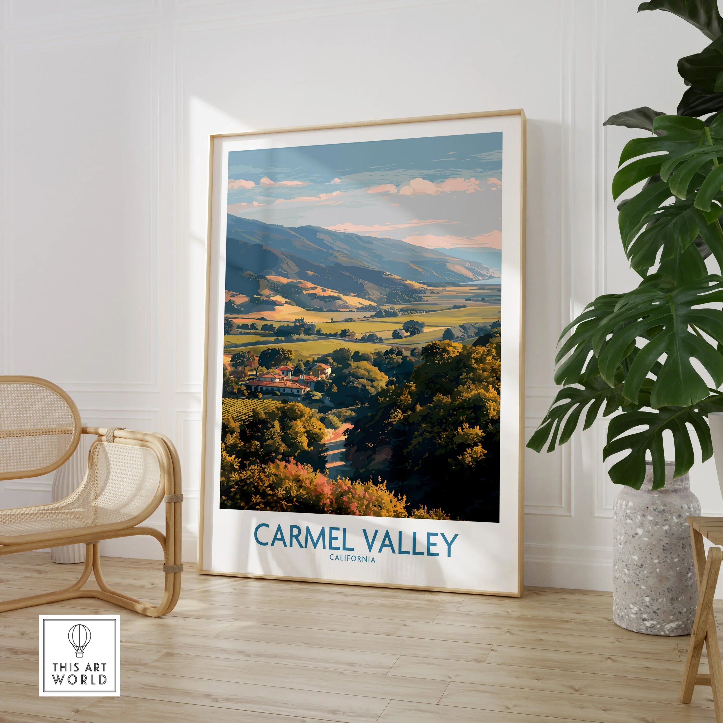 Carmel Valley California travel poster framed print in modern room with chair and plant