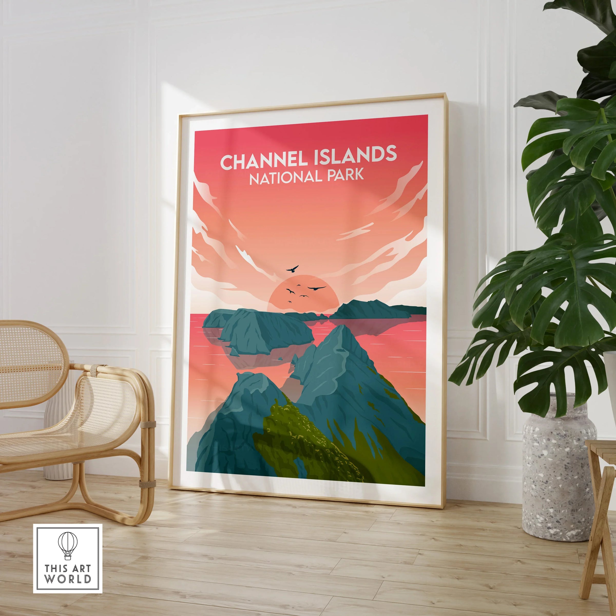 Framed Channel Islands National Park sunset art print in modern room with chair and plant