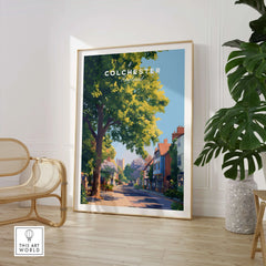 Colchester travel poster framed in modern room with chair and indoor plant