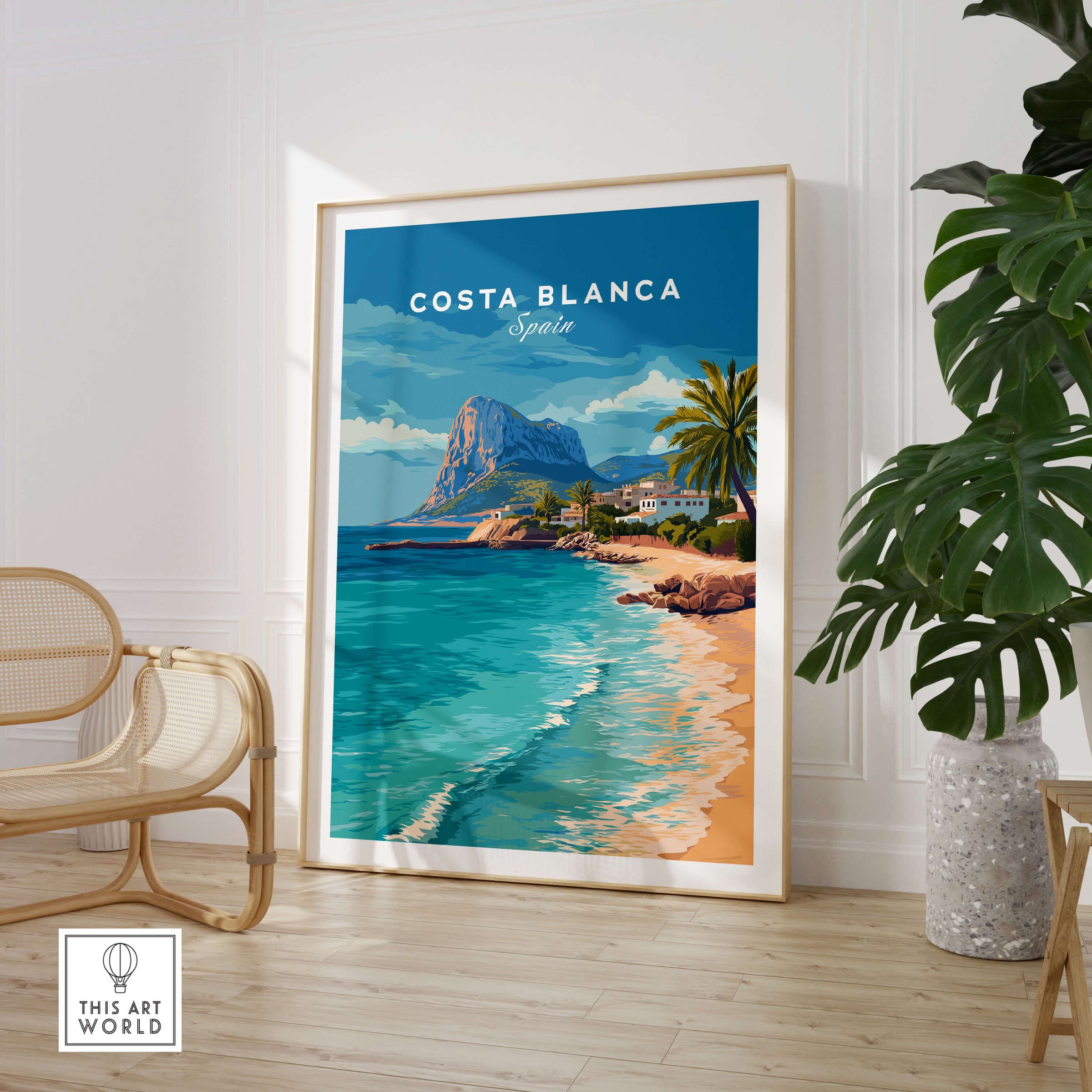 Costa Blanca Spain Travel Art – Mediterranean Village & Turquoise Sea Landscape Poster displayed in a modern interior setting.