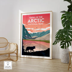 Framed Gates of the Arctic National Park print in modern room with chair and plant