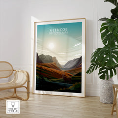 Framed Glencoe National Park travel poster in modern room with chair and green plant.