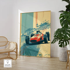 Framed vintage race car wall art in modern room with chair and potted plant