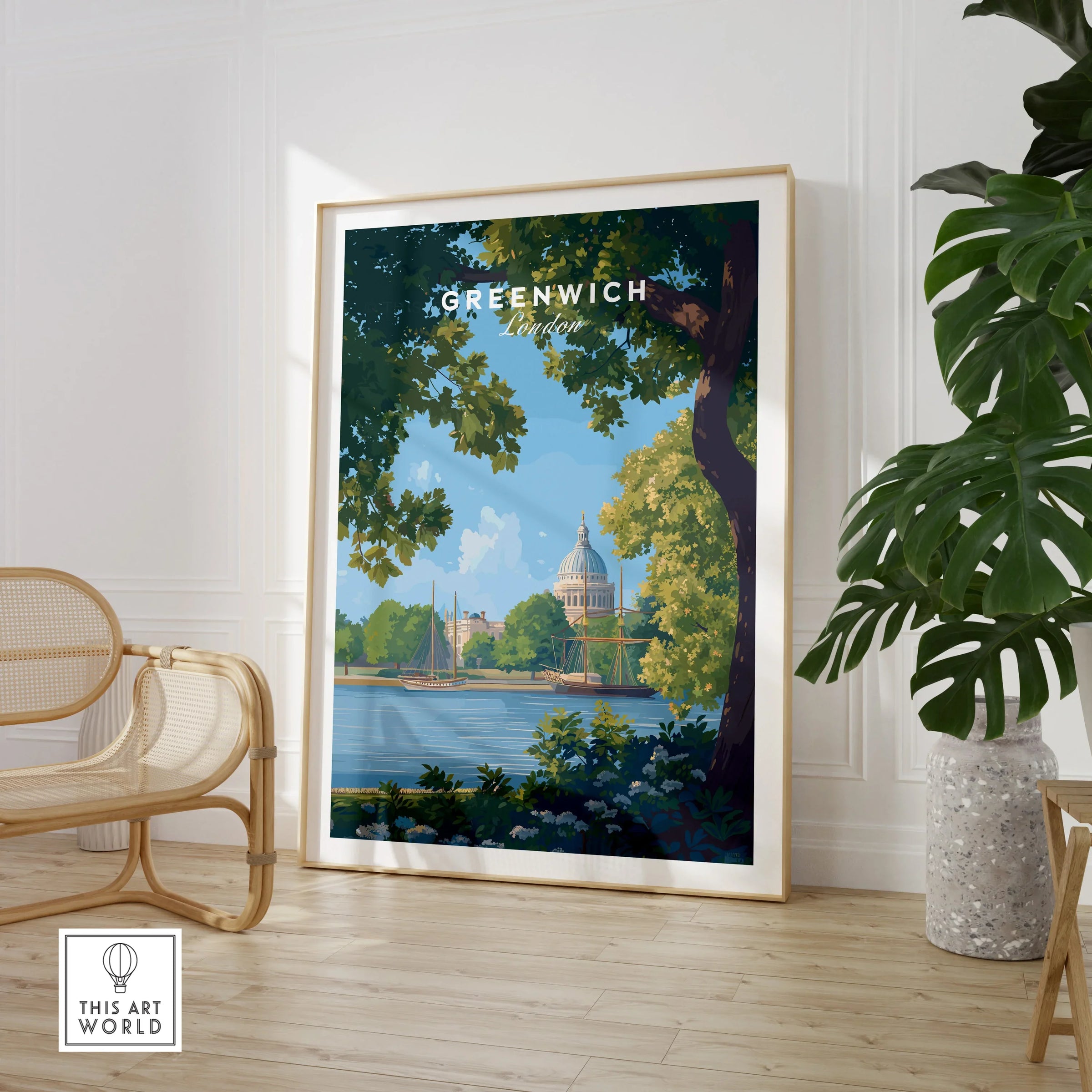 Framed Greenwich London travel poster in modern room with plant and chair