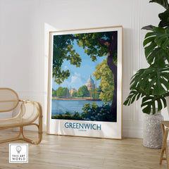 Framed Greenwich London travel poster in modern room with rattan chair and leafy plant.