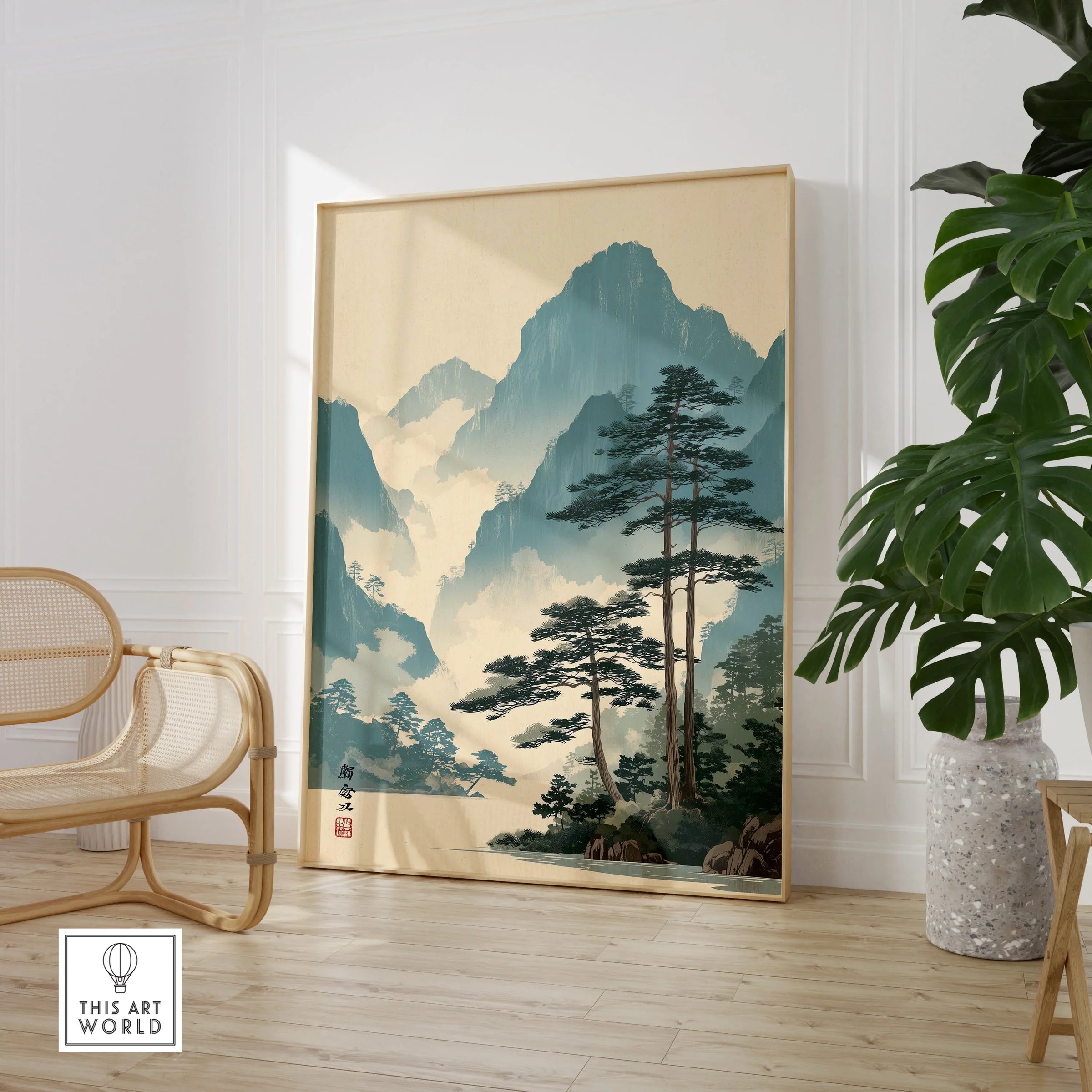 Framed Japanese woodblock landscape print in modern room with chair and indoor plant