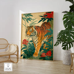 Framed Japanese tiger art print with florals, displayed in modern room with chair and plant