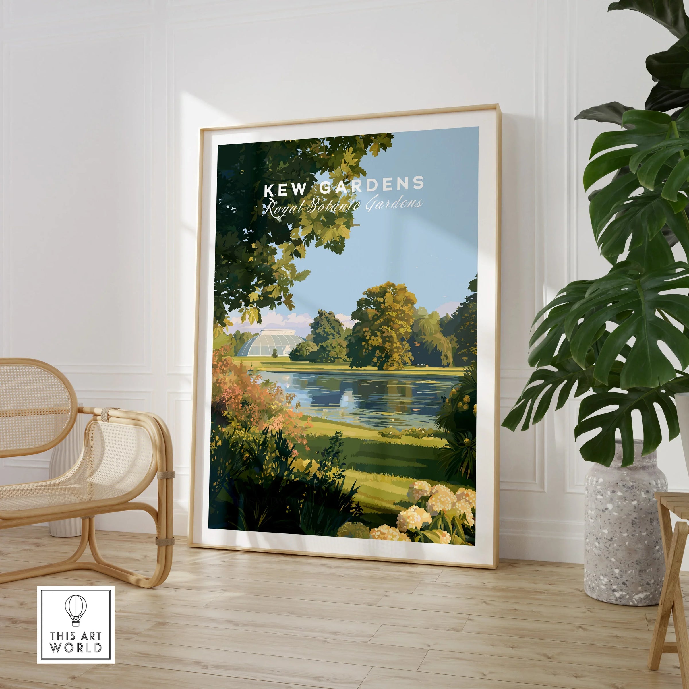 Framed Kew Gardens travel poster print in stylish room with chair and indoor plant