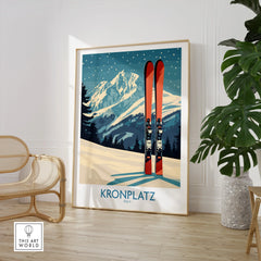 Framed Kronplatz Italy ski travel poster with mountains, styled in modern home with chair and plant