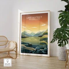 Framed Lake District National Park print in modern room with chair and plant